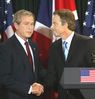 war_bush_blair_cop_a_feel.jpg